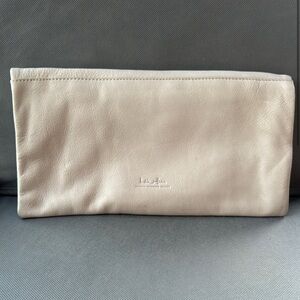 Like New India Hicks Cream Leather Clutch